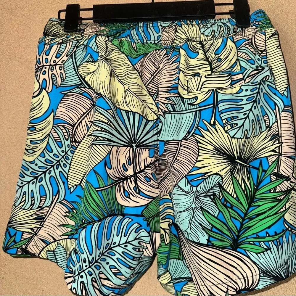 Blue and Green Board Shorts with Tropical Print